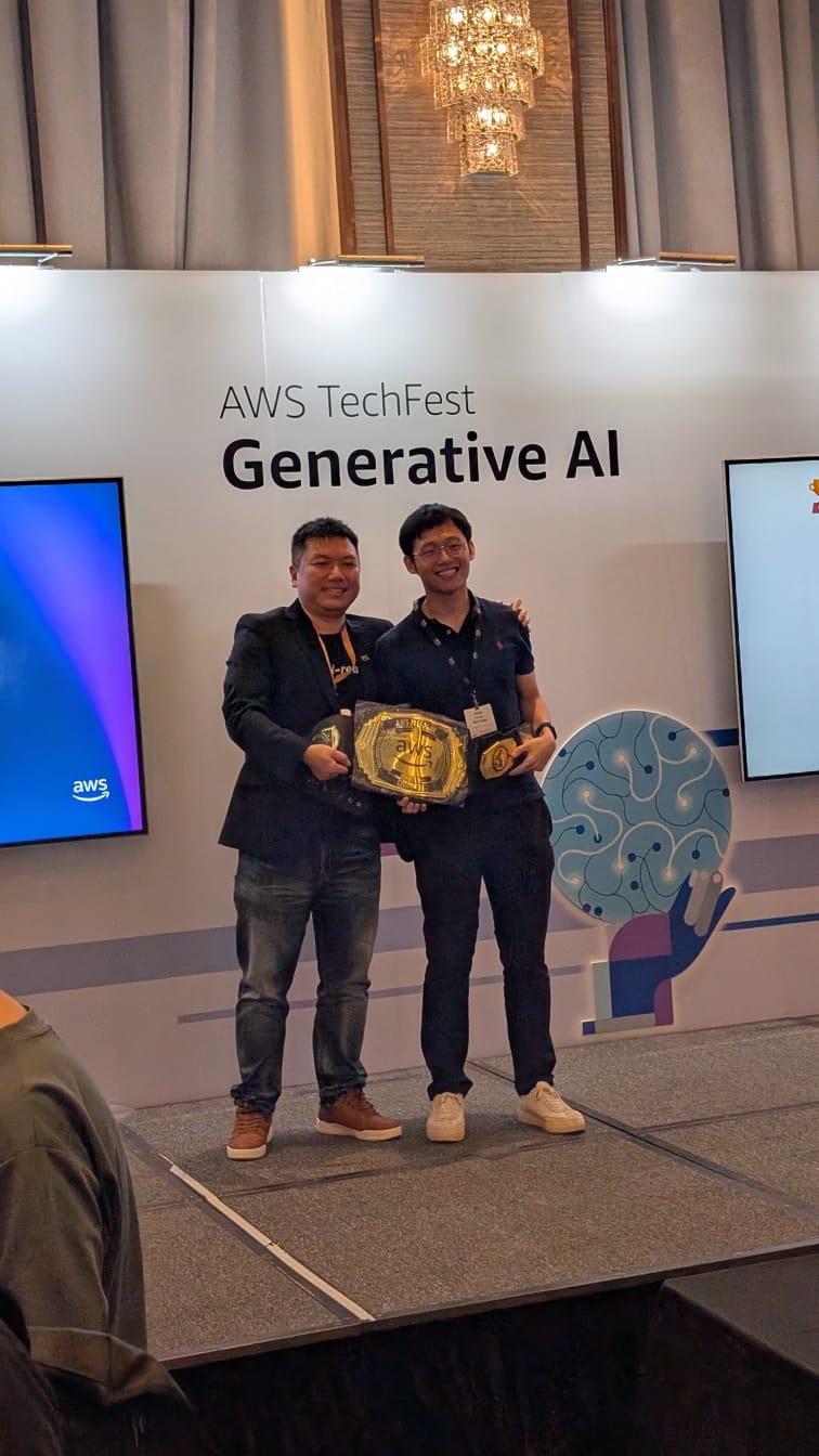 Alan Wong holding the championship belt at AWS TechFest Generative AI