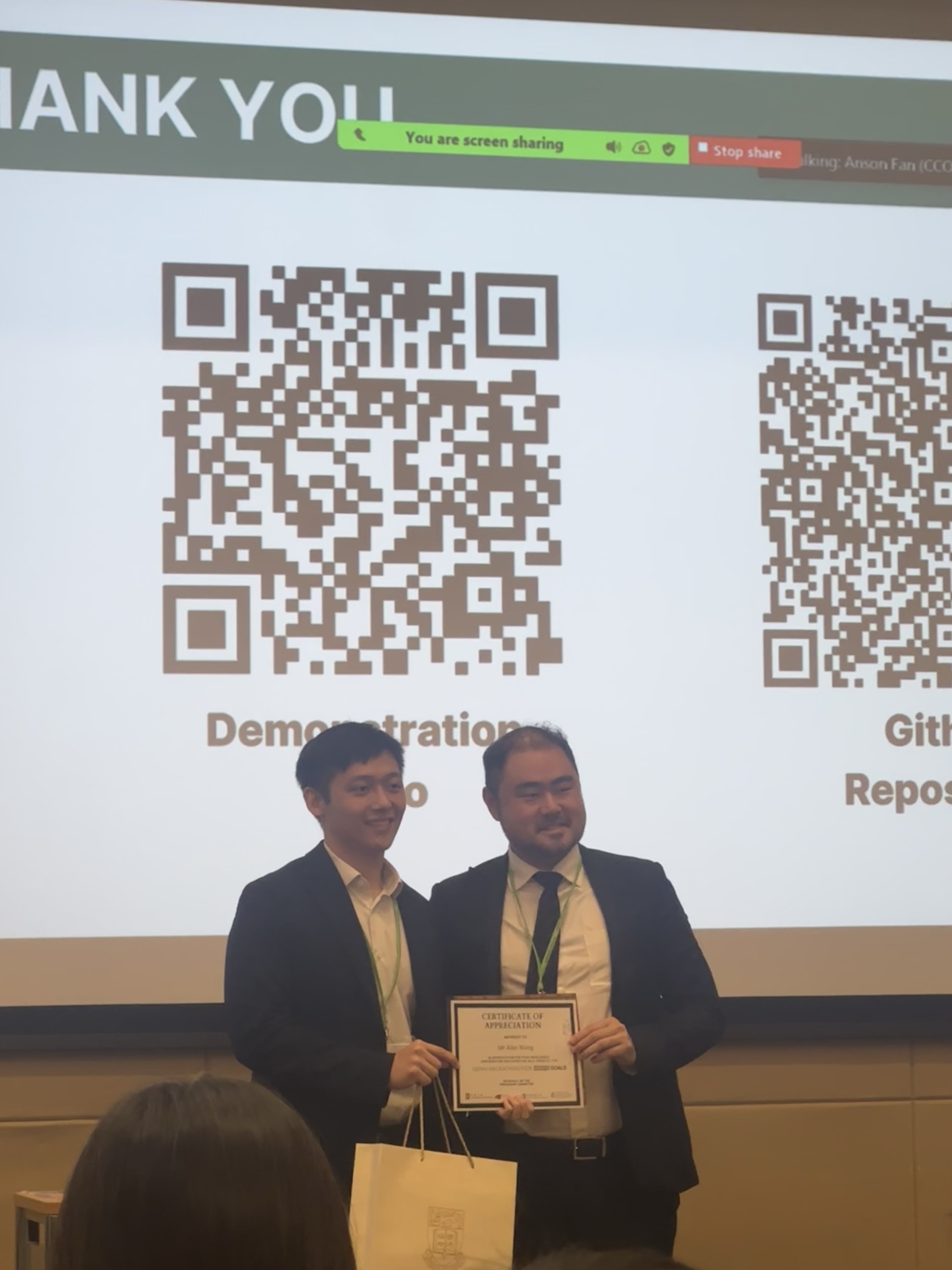 Alan Wong receiving a certificate of appreciation as a Hack4SGD judging panellist